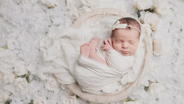 The Precious Moments: Capturing Newborn Magic Through Photography